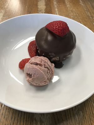Chocolate cake with strawberry mousse and strawberry ice cream.  at Foodhisattva in Cleveland Heights