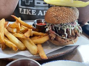 Crispy oyster mushroom sandwich and fries.   at Nic's on Beverly in Los Angeles