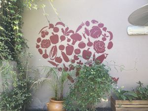 Wall painting reminded me of older vegan cookbooks and Benjamin Zephaniah  at Nic's on Beverly in Los Angeles