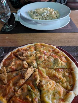 vegan Alfredo and vegan chicken pizza at Vegan In Our House in Cairo
