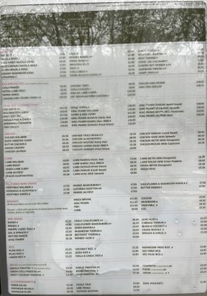 The menu in the window   at Radha Krishna Bhavan in South West London
