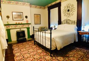 Our Hawthorne Room is wheelchair accessible, and has a private bath, aromatherapy, DirecTV, and luxurious triple-sheeted bed at Old Caledonian Bed & Breakfast in Caledonia