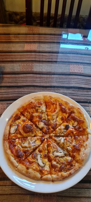 Vegetarian (not vegan) pizza at Yangshuo Mountain Retreat in Yangshuo