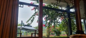 Beautiful view from indoor restaurant at Yangshuo Mountain Retreat in Yangshuo
