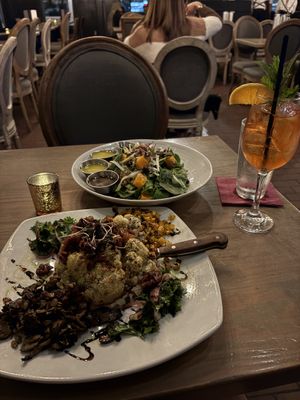 Cauliflower dish and modified harvest salad. Plus a NA spritz!   at George Bistro + Bar in Pensacola