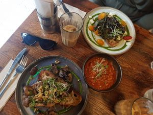 Vegan option of mushrooms. Vege option of heirloom tomatoes, mozzarella, pesto and crispy kale. at Another Heart To Feed in Manchester