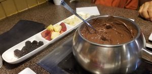 Chocolate fondue is Enjoy Life with fruit dippers at The Melting Pot in Raleigh