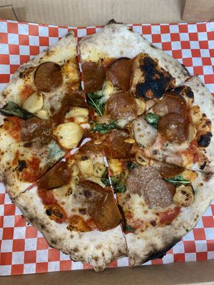 Vegan Pepperoni Pizza with Roasted Garlic and Herbs  at The Pizza Collective in Reno