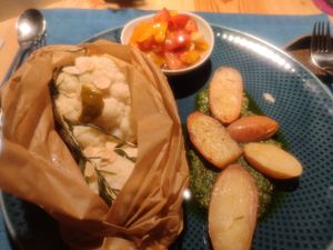 Baked cauliflower, potatoes with pesto sauce and tomato salad at aufatmen in Leutasch
