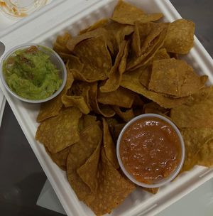 chips with salsa and guac  at Mosa's Joint in Guam