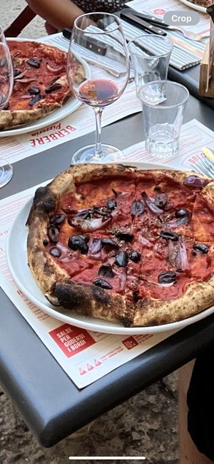 Pizza with olives and onions, delicious but a bit light on the toppings   at Berberè in Verona