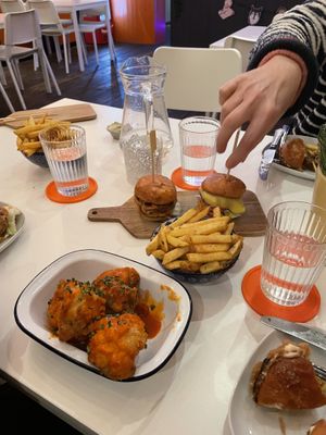 Middle: facon patty, impossible burger. In front of those: rosemary chips. Very front: cauliflower wings   at Tilt in Plymouth