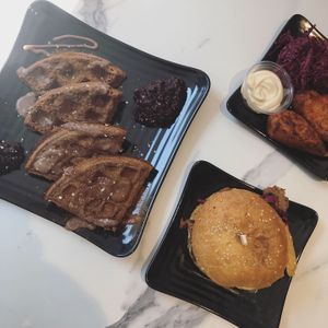 Waffles, chicken wings and shiitake burger. at Copper Branch in Strasbourg