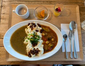 Bean curry (left), and seasonal cold vegetable curry (right) with tofu. Don’t know if the soup is vegan.  at Nanahoshi Curry in Kanazawa