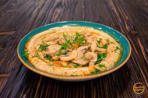 Hummus with mushrooms  at Hummus Original in Madrid