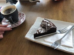 Cake and coffee   at Meli Cafe in Newcastle Upon Tyne