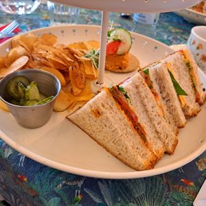 Sandwiches, crisps, pickled cucumbers, and oatcakes with hummus at The Butterfly and the Pig - City Centre in Glasgow