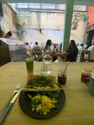 Banh mi sandwich with green juice  at Boulenc in Oaxaca
