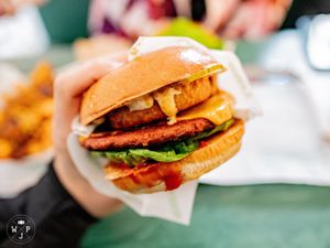 Hightop: Henry's Paddie, lettuce, tomato, pickles, vhedder, onion rings, with smokey BBQ and Ranch Sauce  at Henry's Burgers in Fitzroy