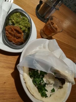 Hummus in pita with complimentary mint tea at Hummus Bar - Király Utca in Budapest