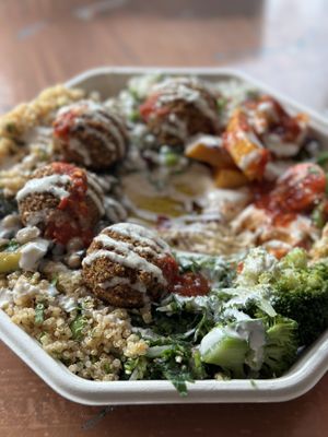 The lunch box, you get light fluffy falafels with an array of salads, plus hummus and bread. The tahini sauce was so delicious too. So good!!!  at Go Falafel in Liverpool