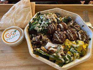 Falafel and salad box with extra tahini and aubergine  at Go Falafel in Liverpool