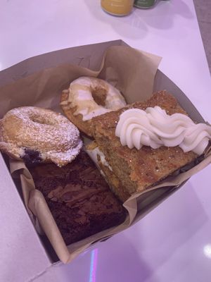 Donuts, square chocolate brownie, carrot cake at Erin McKenna's Bakery in Santa Monica