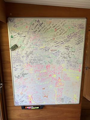 Visitors board! (The cabin)  at The Base Vegan Retreat & Small Animal Sanctuary in Bristol
