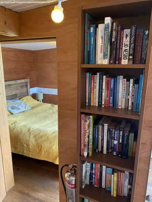 Books in the cabin  at The Base Vegan Retreat & Small Animal Sanctuary in Bristol