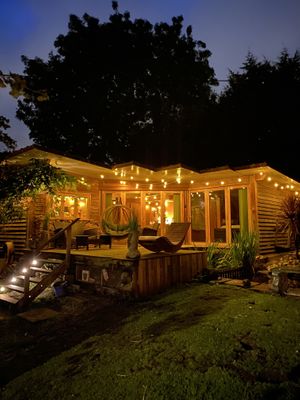 The cabin at night  at The Base Vegan Retreat & Small Animal Sanctuary in Bristol
