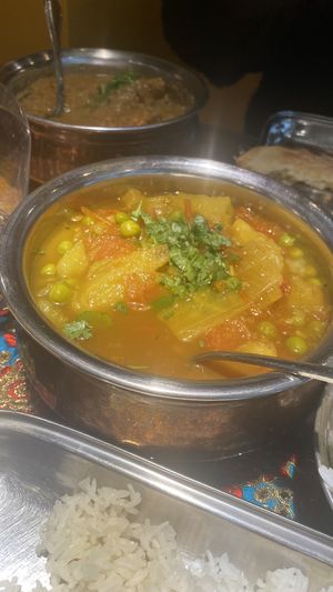 Aloo Mutter: Advertised as “potato and peas in a brown gravy.” Not brown, not gravy. at Spice Juneau Indian Cuisine in Juneau
