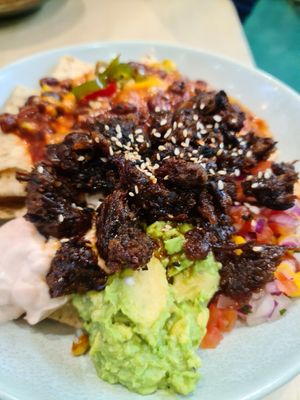 Cheesy nachos with cheeeeekin at Home Vegan Bar in Docklands