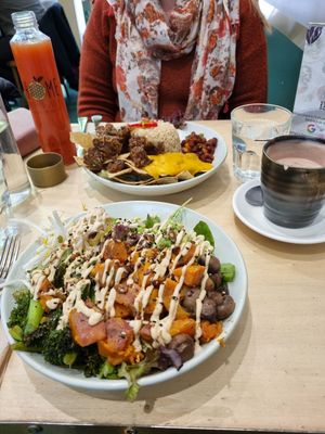 Taco bowl and green salad + cacao latte and juice at Home Vegan Bar in Docklands