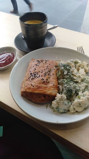 Sausage roll, cheesy broccoli salad & Golden latte at Home Vegan Bar in Docklands
