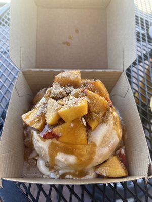 Vegan Peach 🍑 Cobbler Cinnamon Roll 😛  at Cinnaholic in Concord