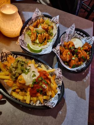 Sizzling "shrimp" tacos, Crispy cauliflower wings, Nacho loaded fries at Loco Ritas in Dundee