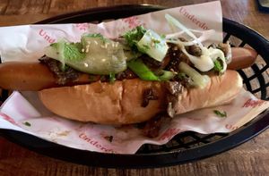 Peeking Dog at Loco Ritas in Dundee