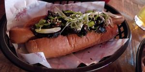 Peeking dog with mushrooms and spring onions at Loco Ritas in Dundee