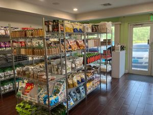 Grocery area: rice, peas, seasonings, seaweed, chips, nutritional yeast, almond/cashew butter, quinoa, porridge stuff, flours, oils, etc at NewLife Natural Vegetation Cell Food in Nassau