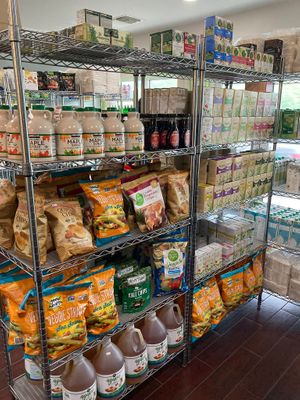 Chips, maple and agave , teabags, plant milk at NewLife Natural Vegetation Cell Food in Nassau