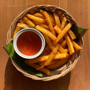 Sweet potato fries served with chilli sauce.  at Go Vegan Bali in Tibubeneng