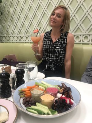 Mezze plate with iced tea cocktail at Ladurée in Beverly Hills