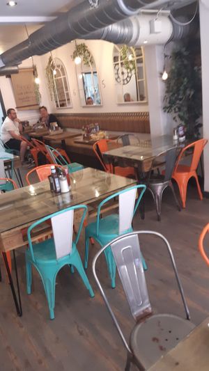 Seating area at Scoff Troff Cafe in St Ives