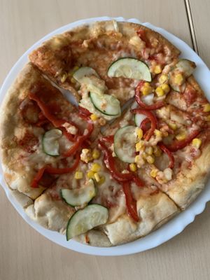 Vegan pizza at Holyfood Delight in Ljubljana