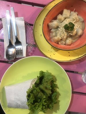Gnocchi with the cream sauce and gallo pinto wrap. The wrap was amazing, gnocchi was bland maybe try the pesto sauce instead of the cream sauce. at Pico Feliz in Samara