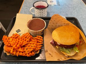 Chili burger, sweet fries, tiramisu, and raspberry soda at Swing Kitchen - Laupenstraße in Bern