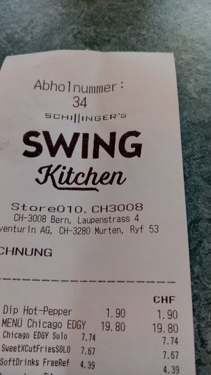 They give you a number to retrieve food at Swing Kitchen - Laupenstraße in Bern