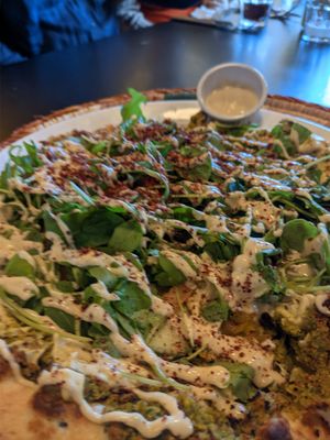 Falafel on flat bread. Tahini sauce at Izz Cafe in Cork