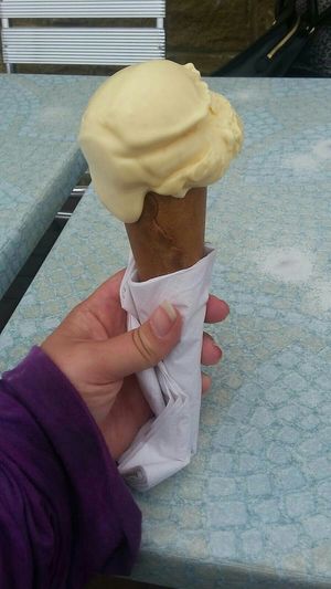 Peach ice cream with sugar cone at Minchella & Co - Sea Road in South Shields