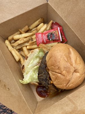 Giddy up Burger with a side of fries  at Tasty Harmony in Fort Collins